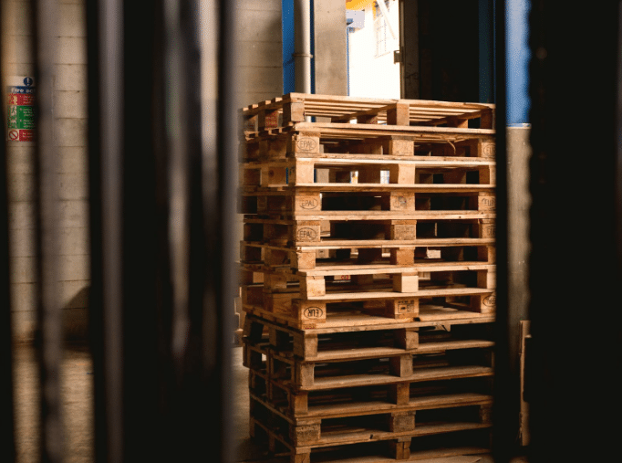 Stacking pallets in transport
